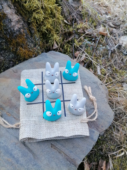 Juuttikangaspussi Onni-peli turkooseilla ja harmailla hahmoilla
